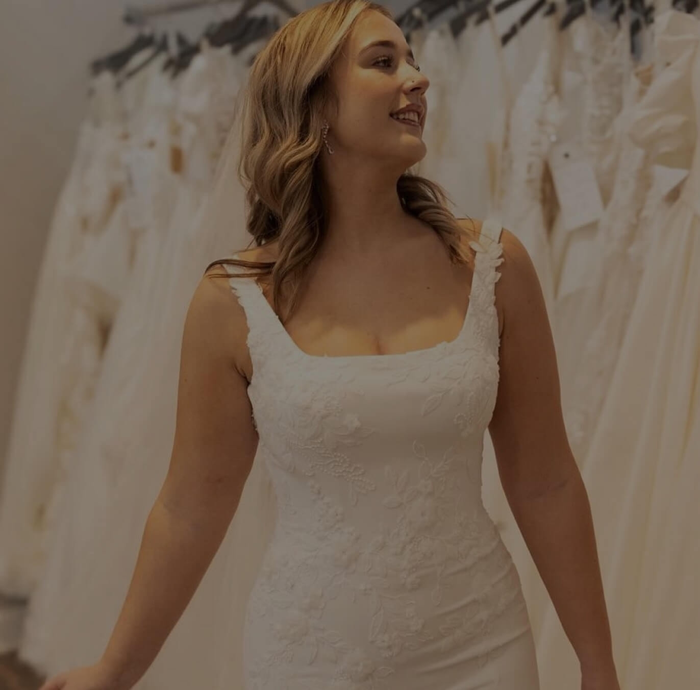 Model wearing a bridal suit. Mobile image