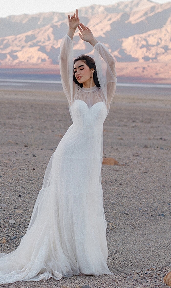 Model wearing a Wilderly Bride gown